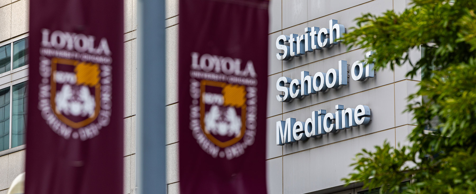Stritch School of Medicine building with Loyola University Chicago banners